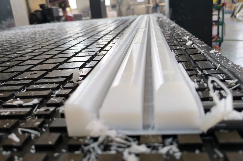 UHMWPE block showing deformation from machining with surface details and texture